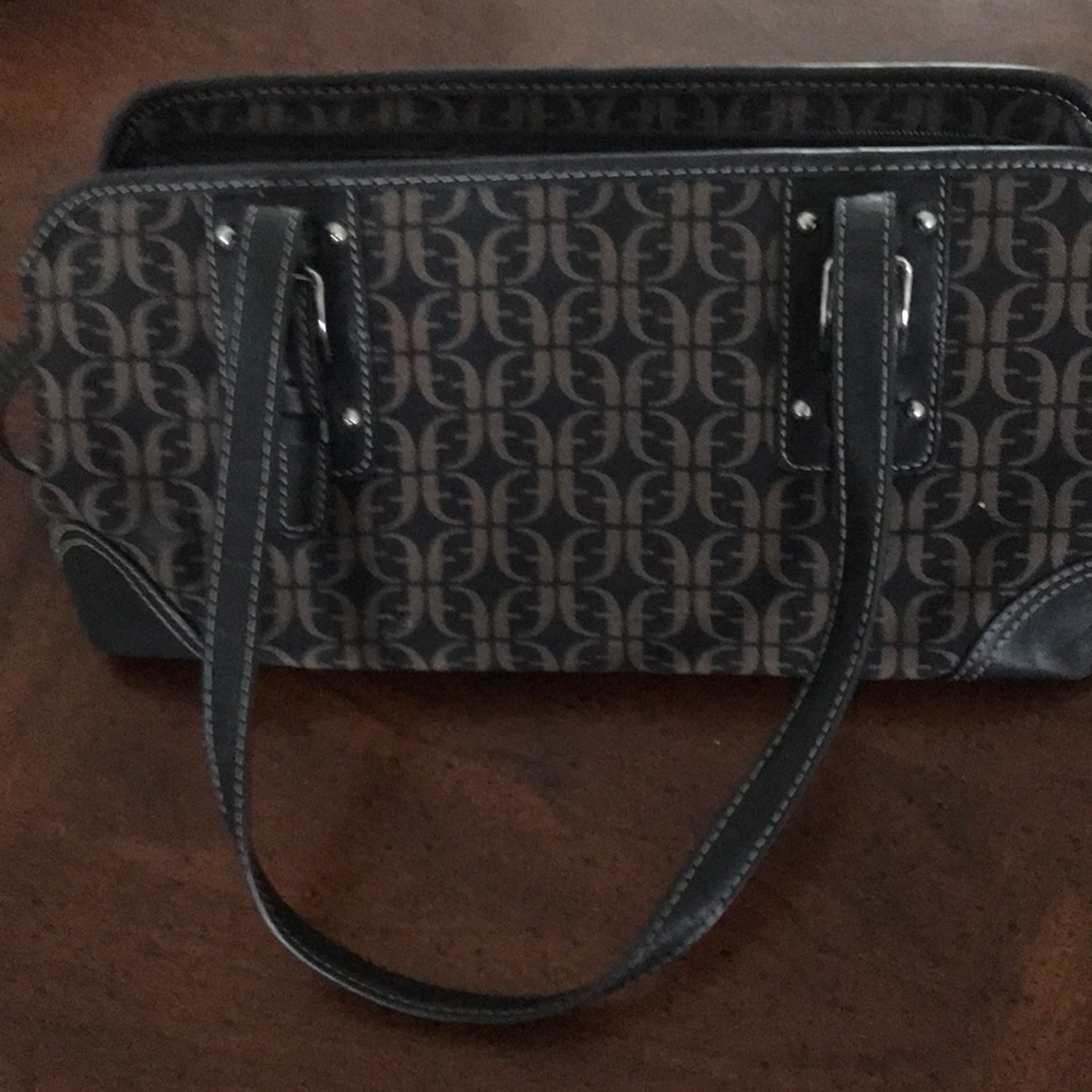 Fossil bag.  Black and brown. .